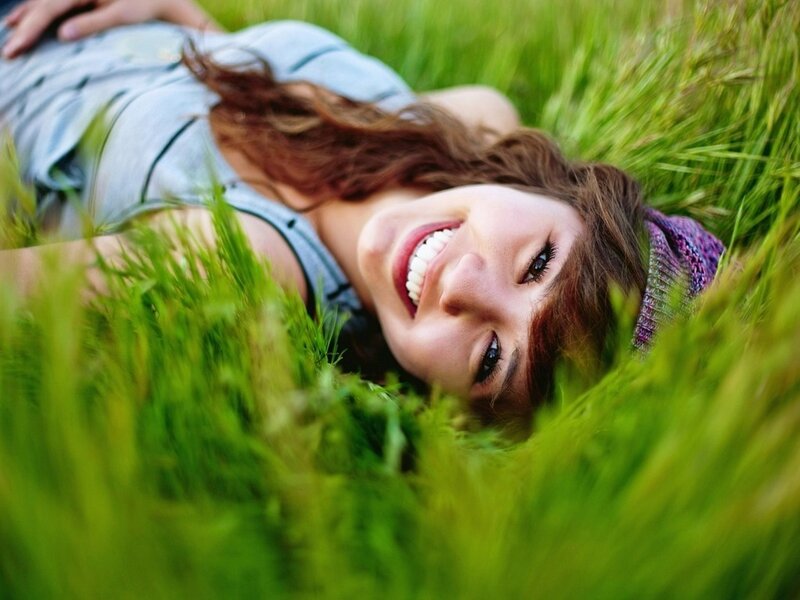 Woman Lying in Grass — Green, Happy