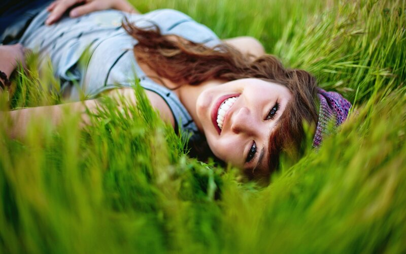 Woman Lying in Grass — Green, Relaxed, Afternoon, Photograph, Hat
