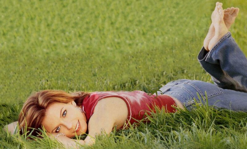 Woman Lying in Grass — Green, Relaxed, Afternoon, Photograph, Jeans