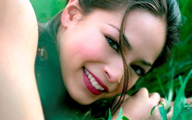 Woman Lying in Grass — Green, Relaxed, Afternoon, Photograph, Smile, Eyes, Skin Tone