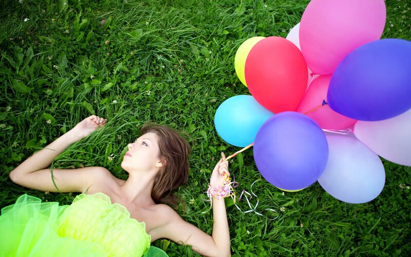 Woman Lying in Grass — Green, Serene, Afternoon, Photograph, Balloons