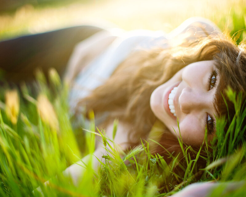Woman Lying in Grass — Green, Serene, Afternoon, Photograph, Sunlight