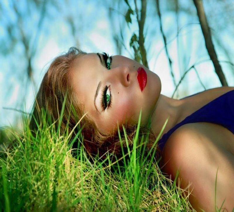Woman Lying in Grass — Green, Serene, Daytime