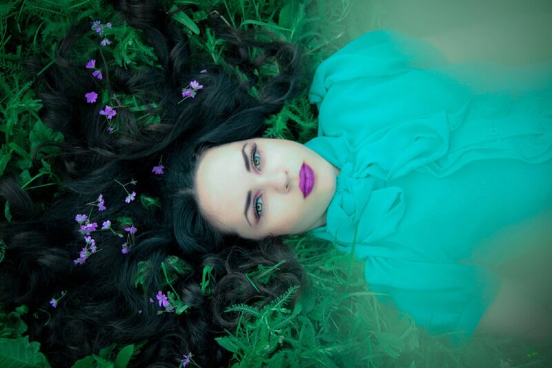 Woman Lying in Grass — Green, Serene, Spring, Photograph, Flowers