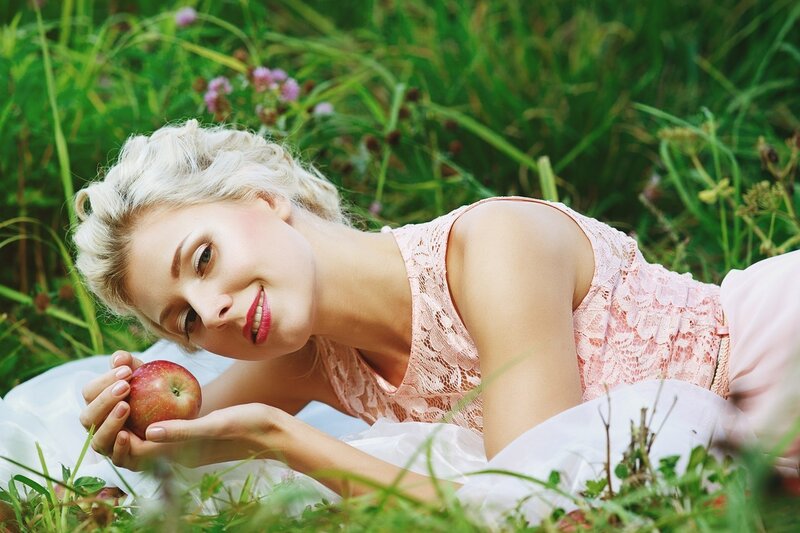 Woman Lying in Grass — Green, Serene, Summer, Photograph, Apple