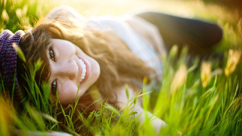 Woman Lying in Grass — Photograph