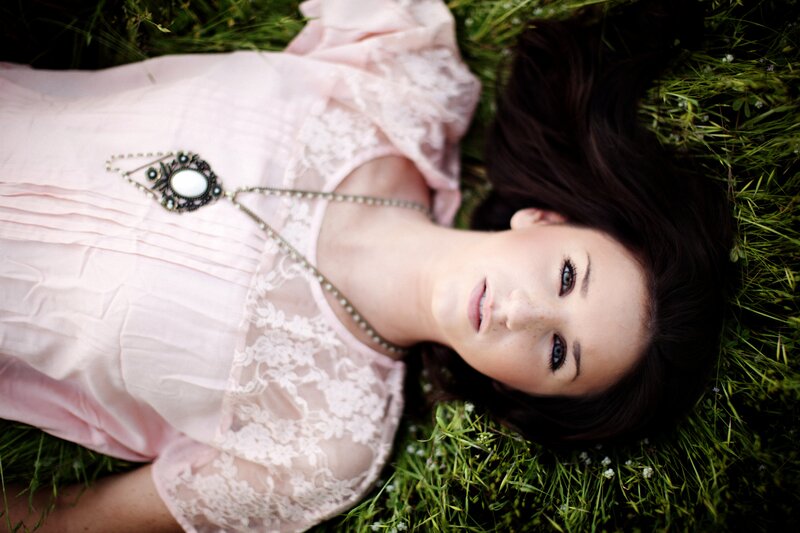 Woman Lying in Grass — Pink, Serene, Afternoon, Photograph