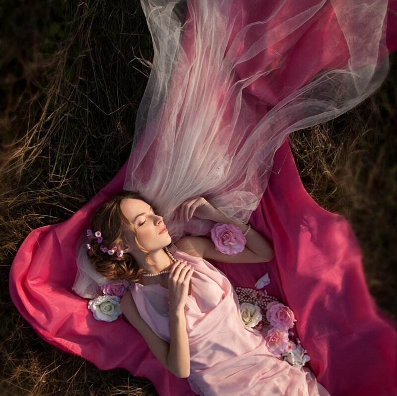 Woman Lying in Grass — Pink, Serene, Sunset