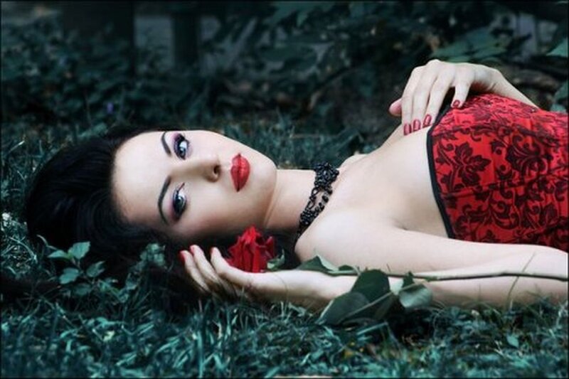 Woman Lying in Grass — Red