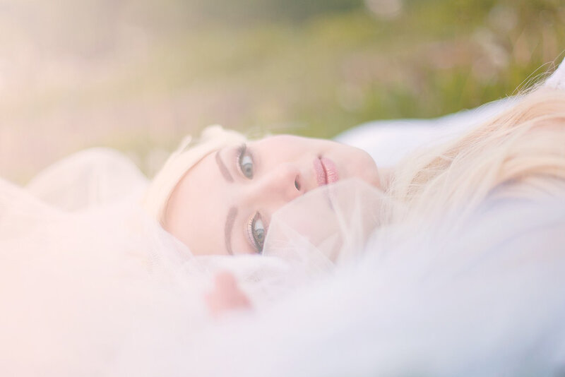 Woman Lying in Grass — White, Serene, Afternoon, Photograph