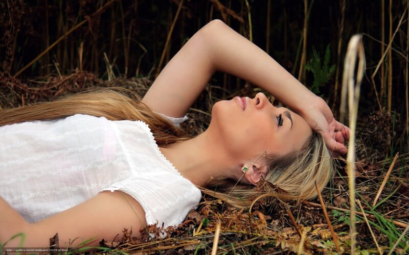 Woman Lying in Grass — White, Serene, Autumn