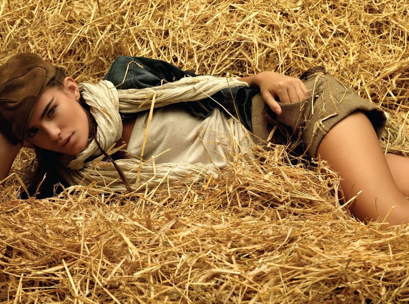 woman lying in hay