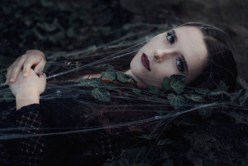 Woman Lying in Ivy — Black, Dramatic