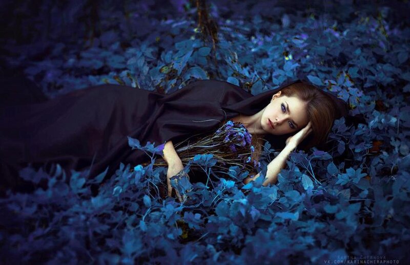 Woman Lying in Leaves — Blue, Dramatic