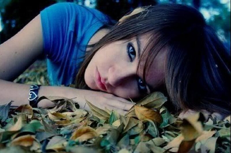 Woman Lying in Leaves — Blue