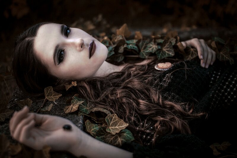 Woman Lying in Leaves — Brown, Dramatic
