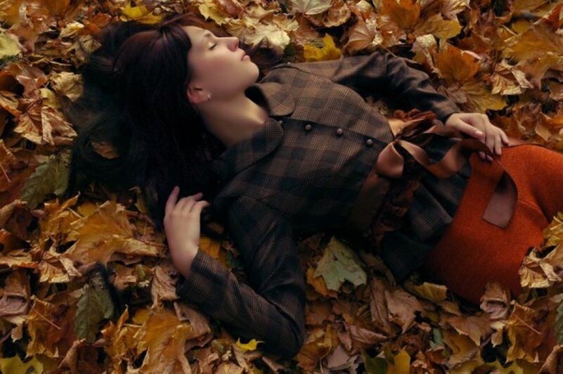 Woman Lying in Leaves — Brown, Serene, Autumn, Photograph, Coat