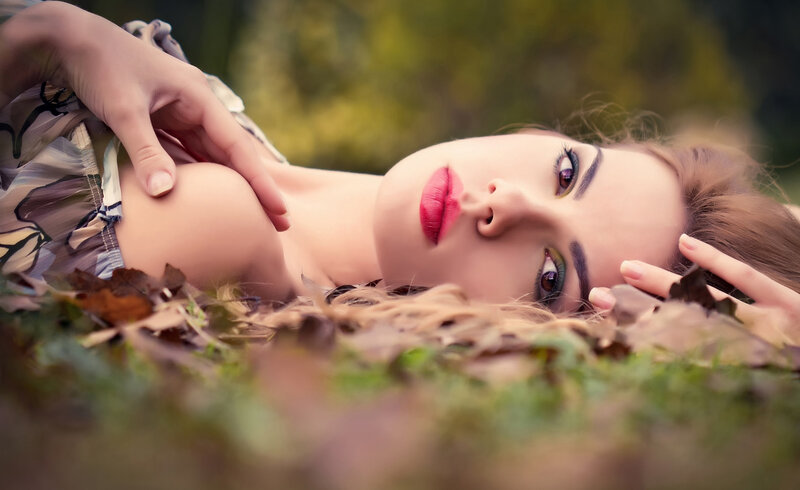 Woman Lying in Leaves — Green