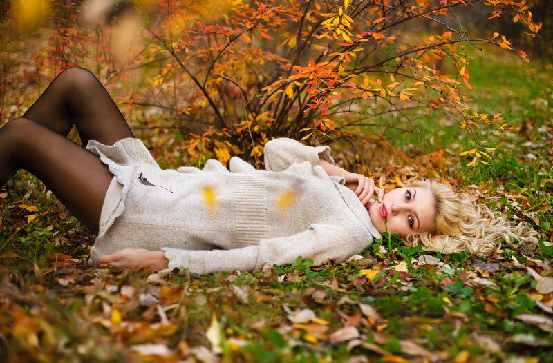 Woman Lying in Leaves — Orange, Calm
