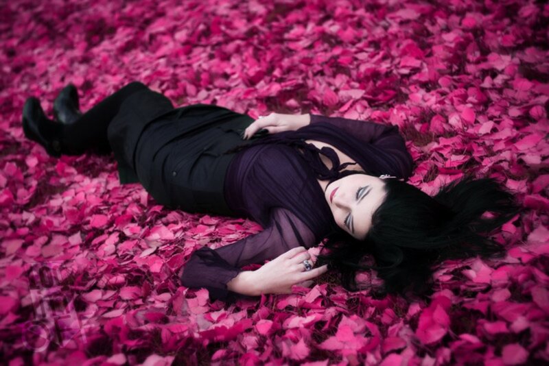 Woman Lying in Leaves — Pink