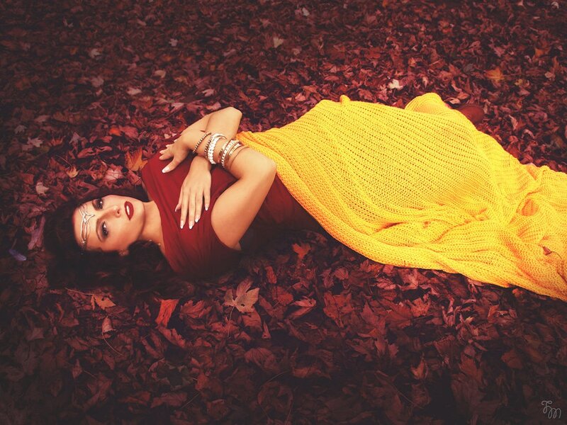 Woman Lying in Leaves — Red, Dramatic, Autumn