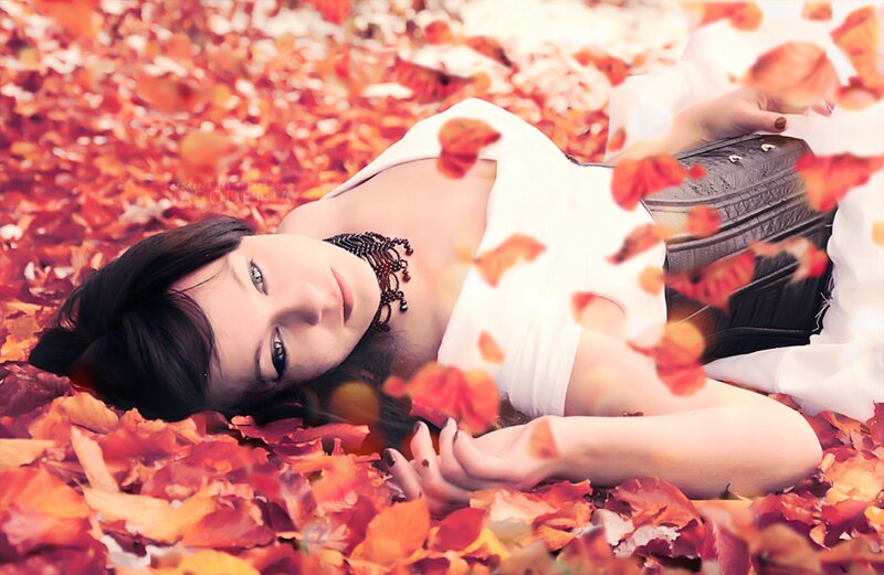Woman Lying in Leaves — Red, Serene