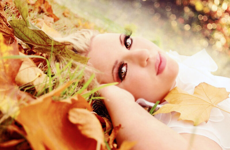 Woman Lying in Leaves