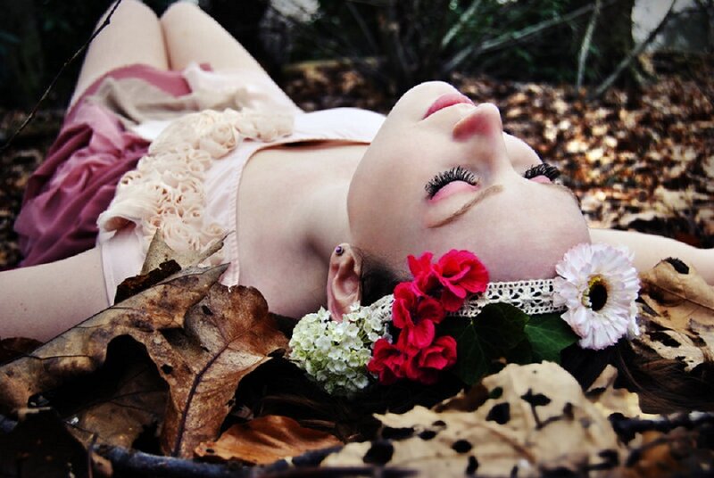 Woman Lying in Leaves — White, Serene