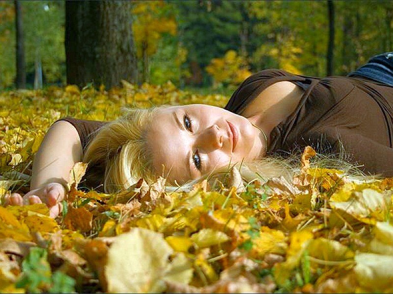Woman Lying in Leaves — Yellow, Calm