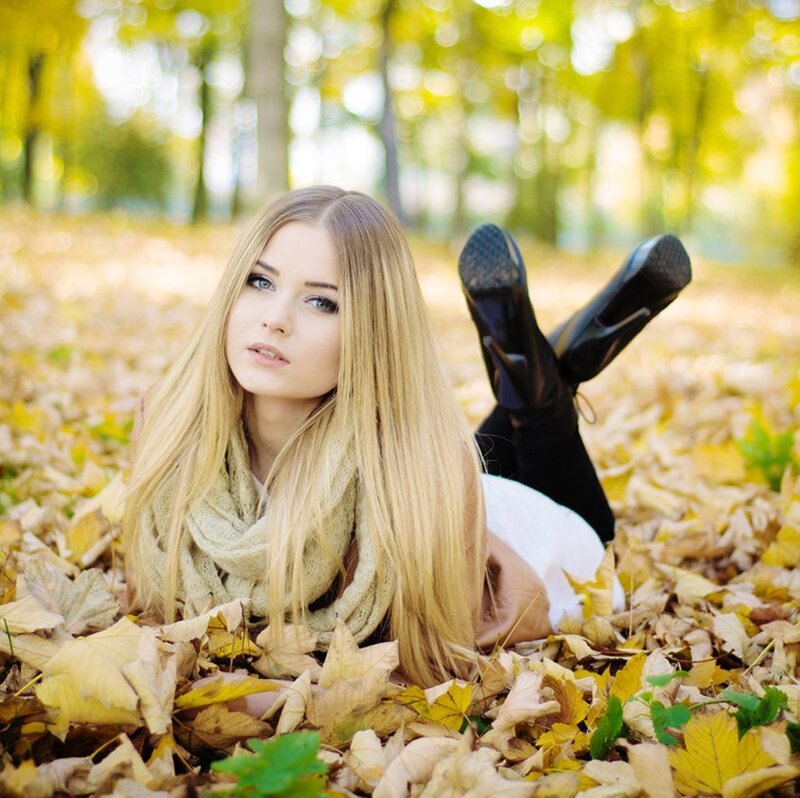 Woman Lying in Leaves — Yellow, Serene, Autumn, Photograph, Trees, Boots