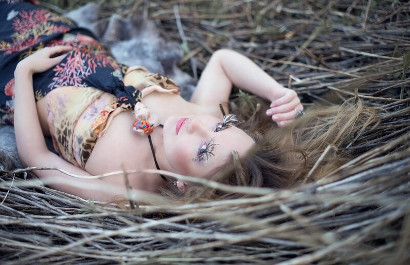 Woman Lying in Nest