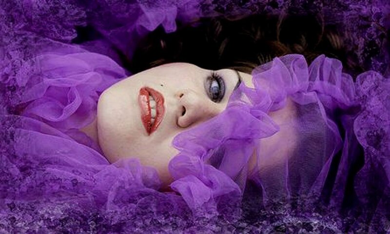 Woman Lying in Purple Fabric