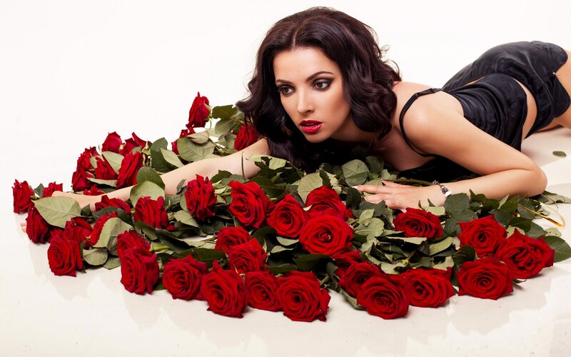 Woman Lying in Roses — Red, Dramatic