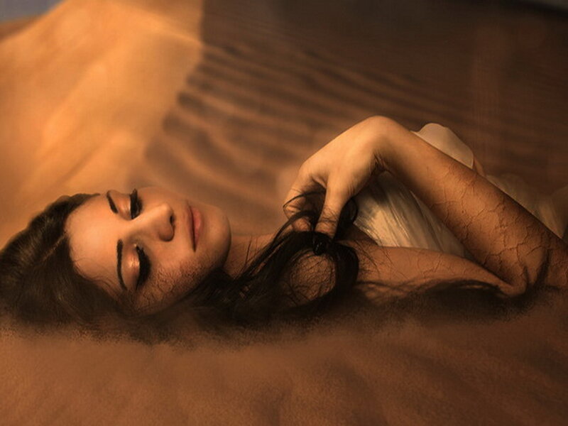 Woman Lying in Sand — Brown