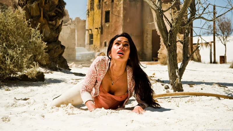 Woman Lying in Sand