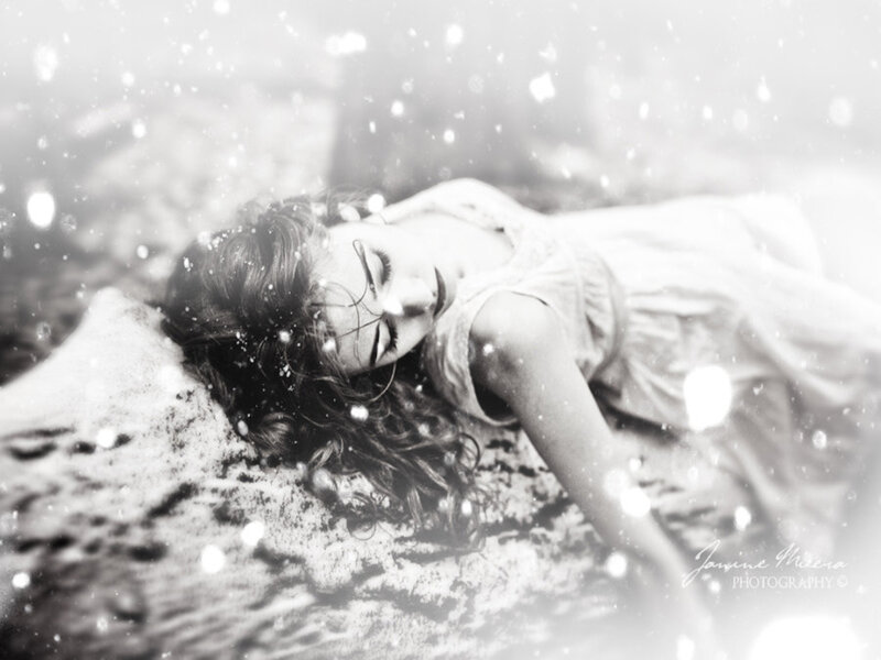 Woman Lying in Snow — Black, Serene