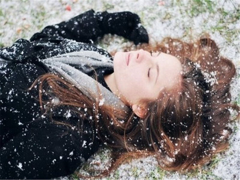 Woman Lying in Snow — Black
