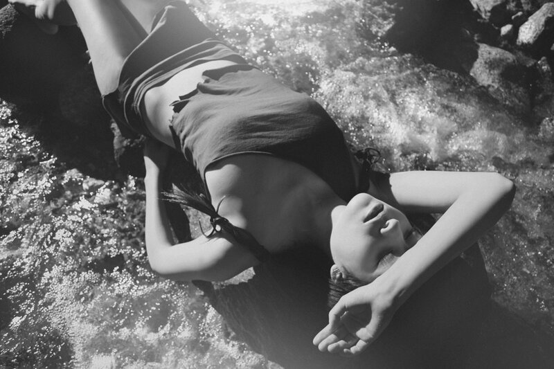 Woman Lying in Stream — Black