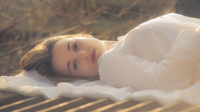 woman lying in sunlight