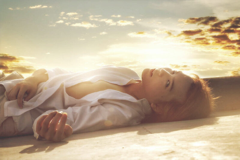 woman lying in sunlight