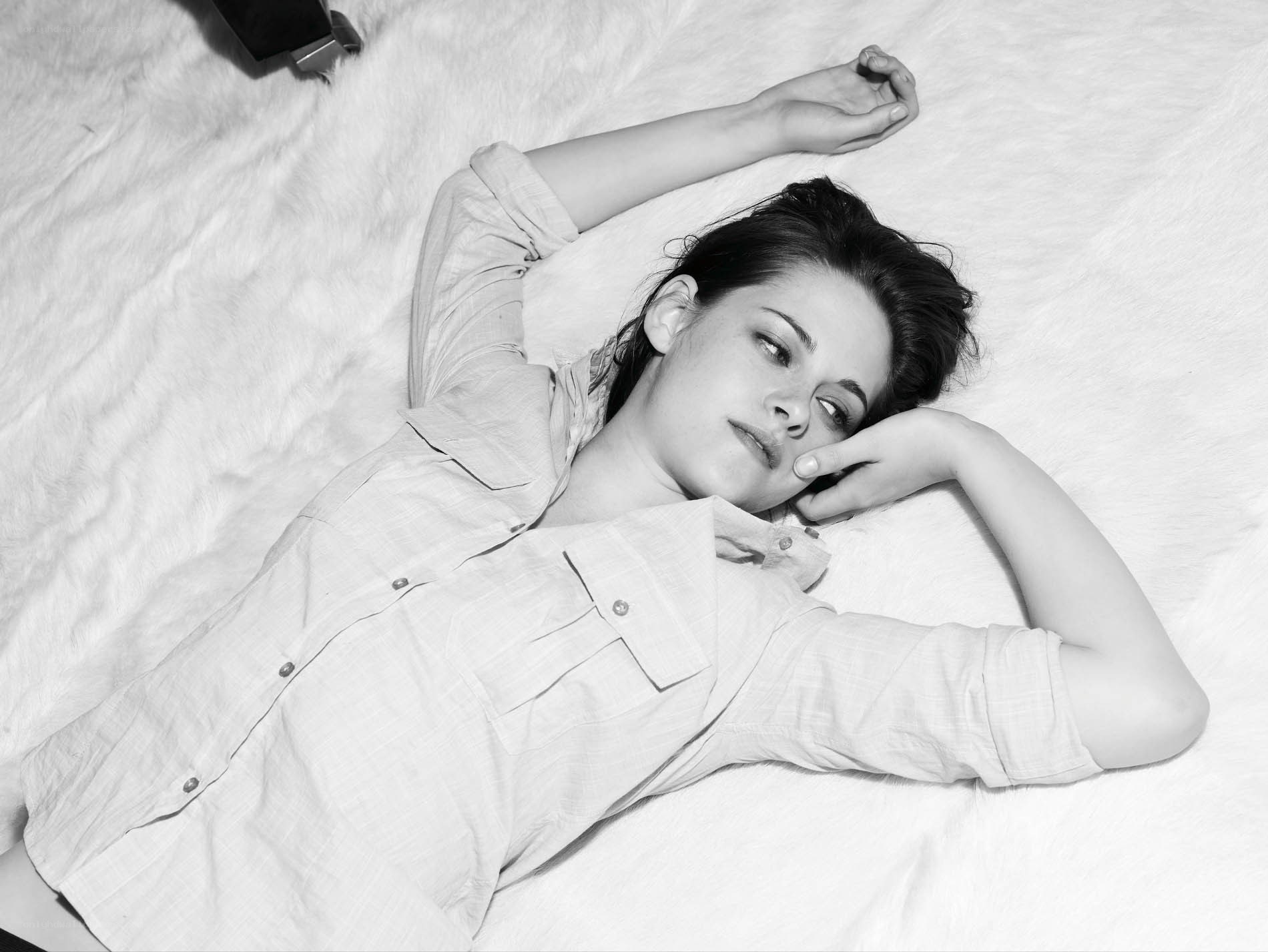 woman lying on a bed