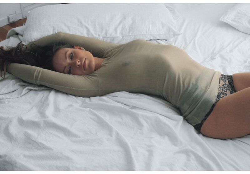 woman lying on a bed