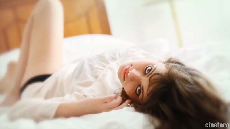woman lying on a bed