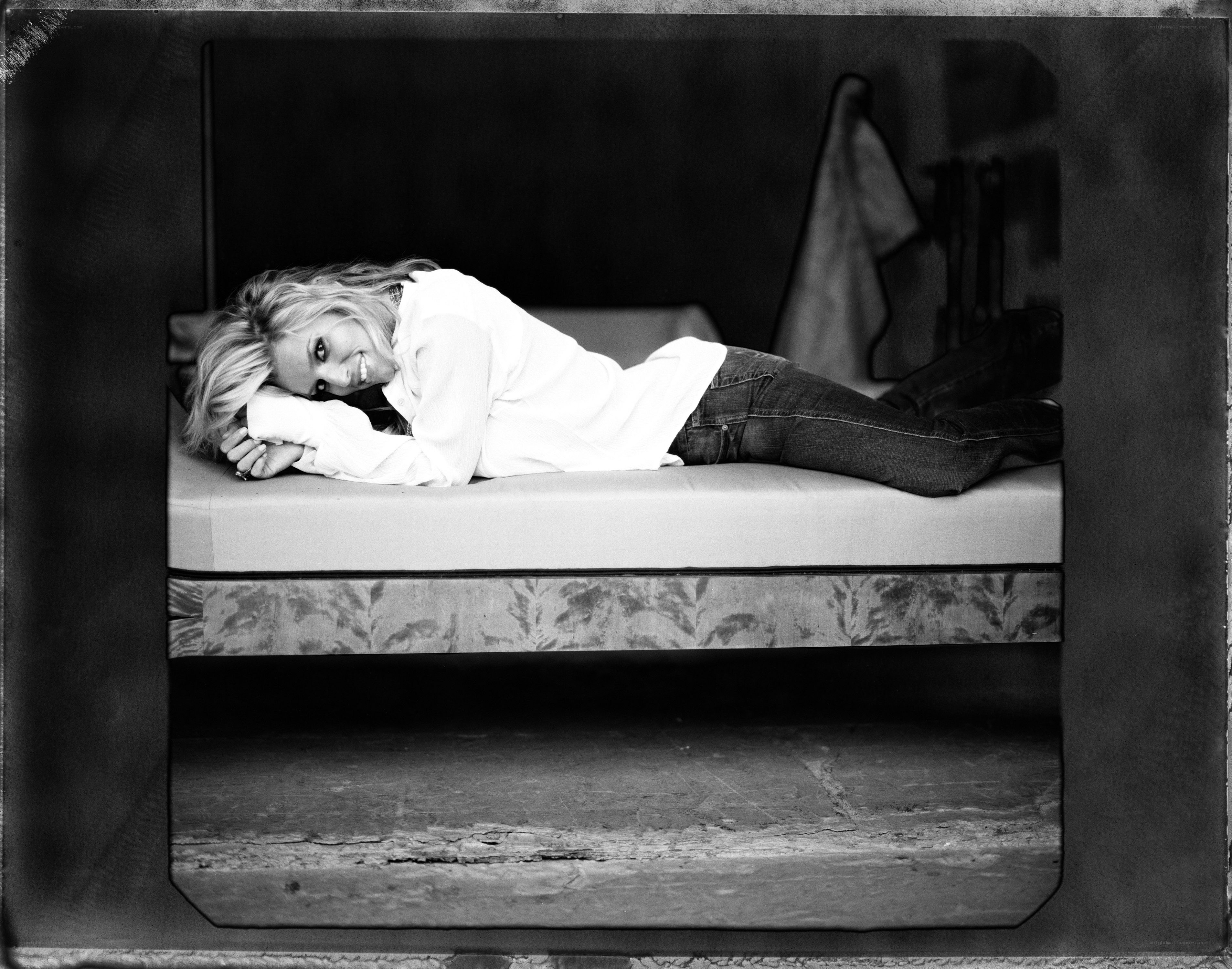 woman lying on a bed