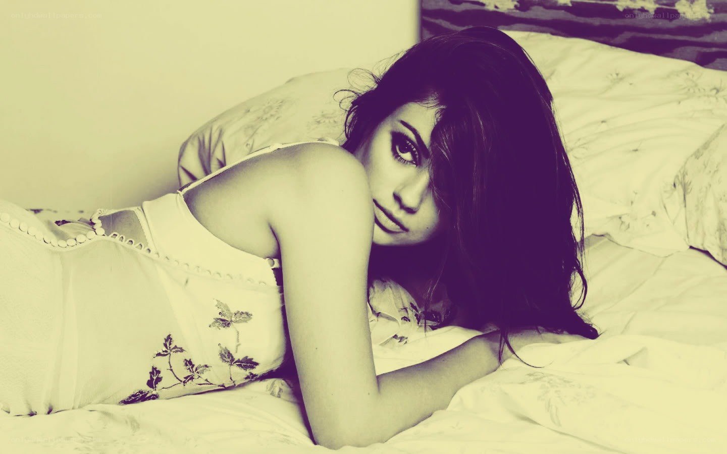 woman lying on a bed