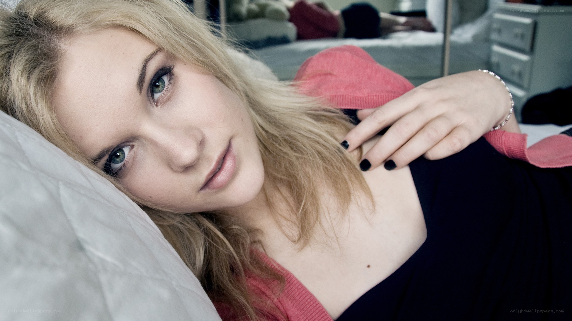 woman lying on a bed