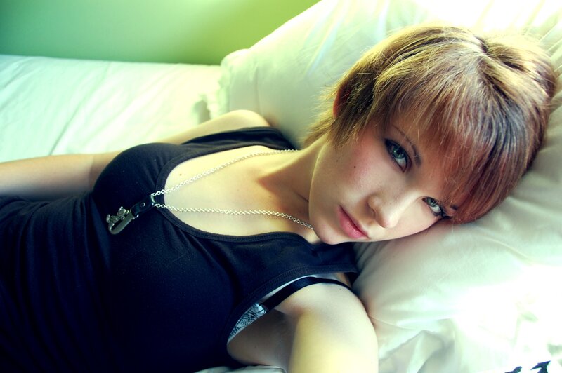 woman lying on a bed