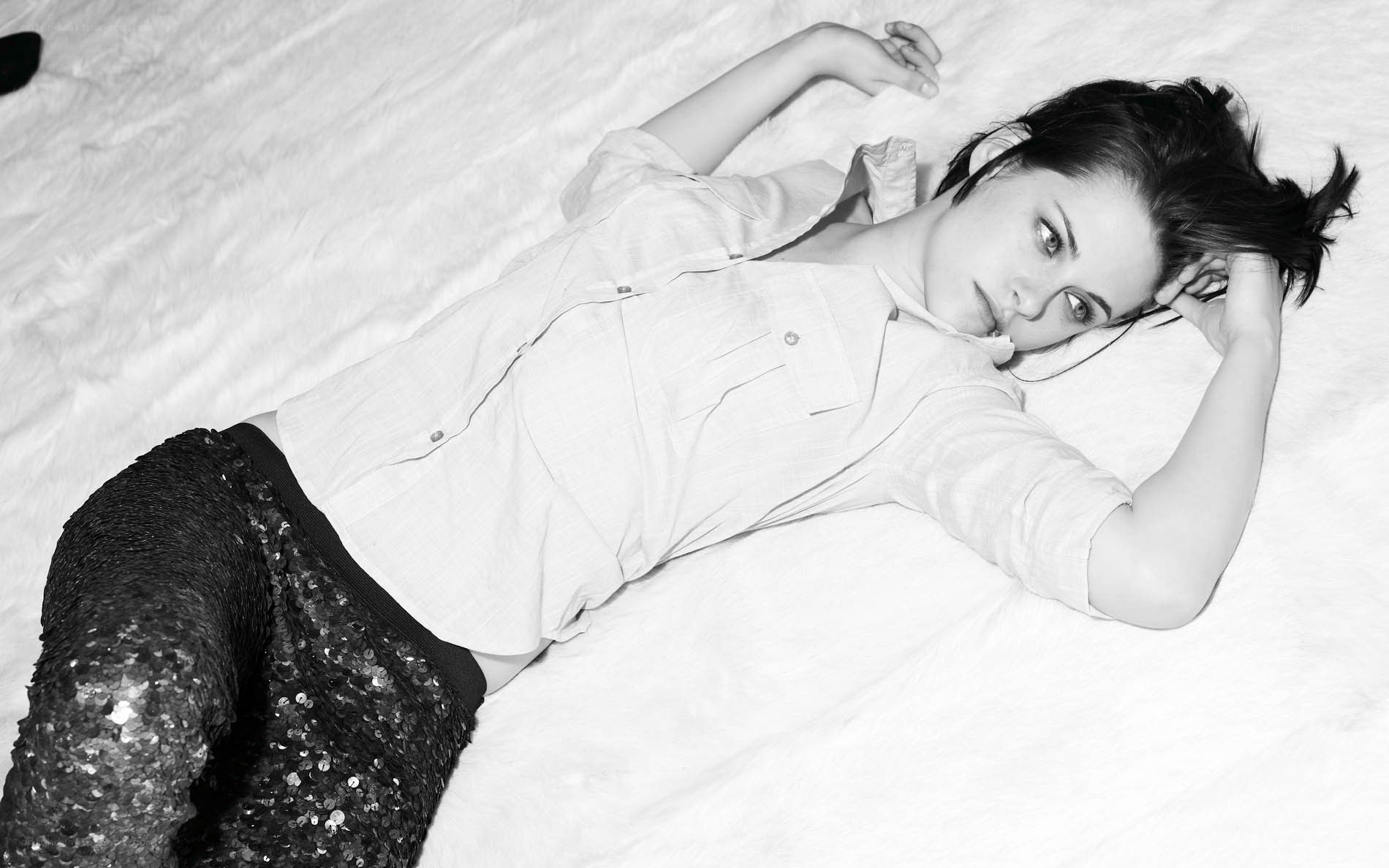 woman lying on a bed