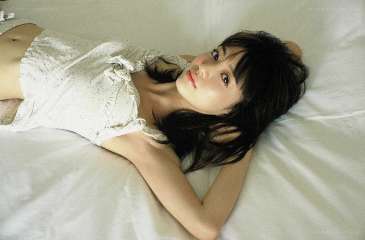 woman lying on a bed
