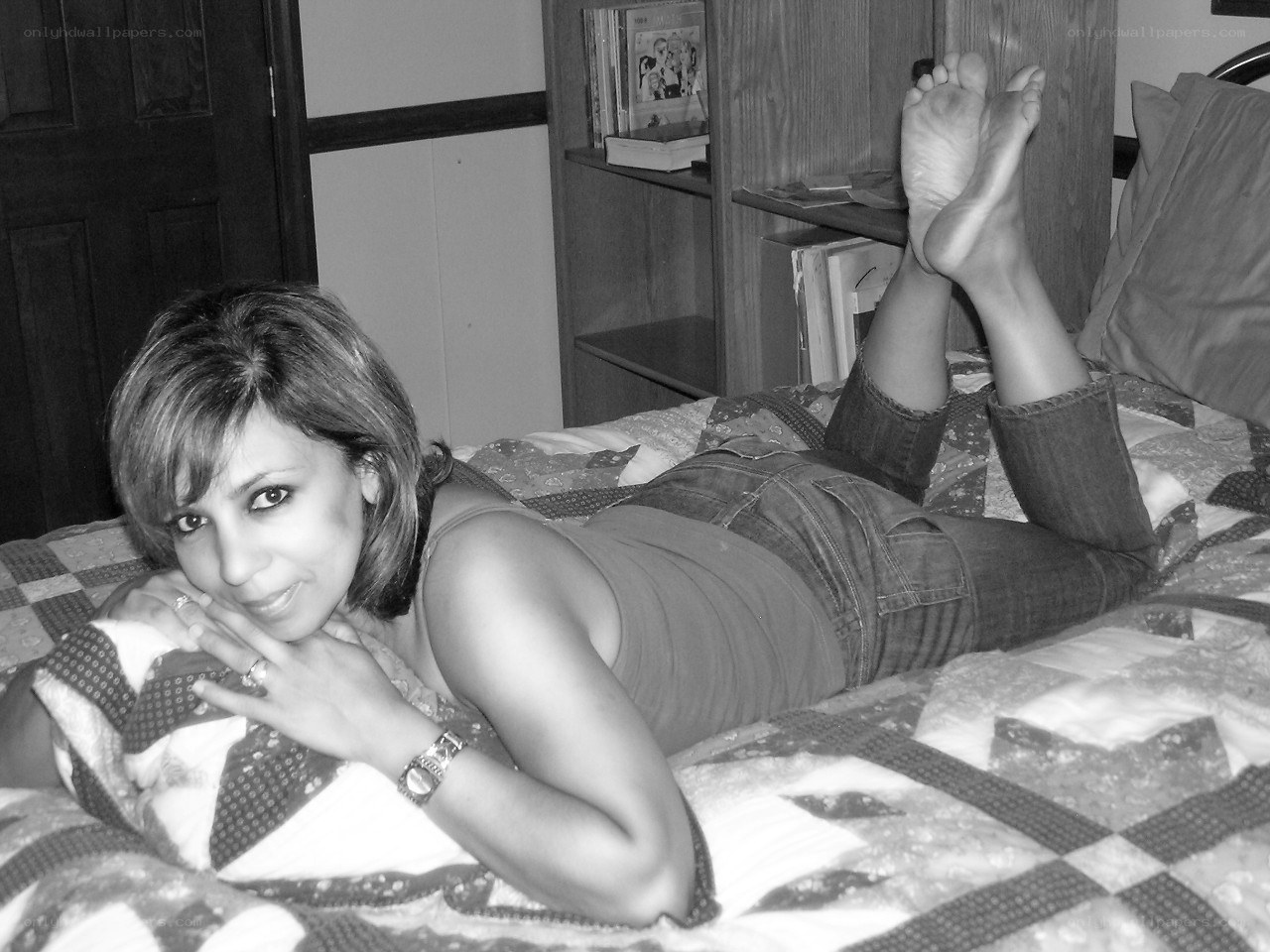 woman lying on a bed